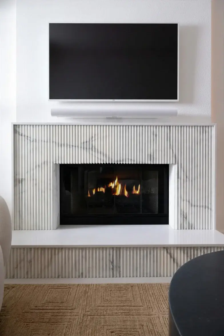 family-room-fireplace-refresh-with-TV-relocated-above-fireplace