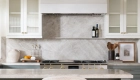 custom-appliance-sloped-hood-with-microcement-finish-in-La-Llabra-Crystal-White-Smooth-texture