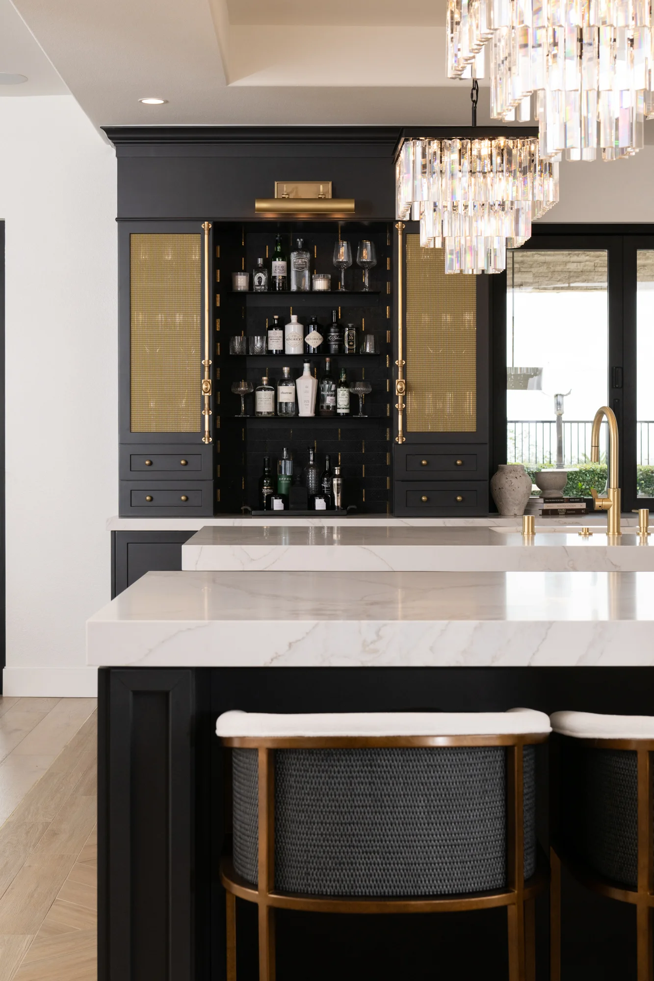 custom-bar-area-includes-brass-mesh-grill-covers-and-decorative-vintage-brass-Cremone-bolts-with-oval-knobs-and-marble-mosaic-backsplash-in-China-Black