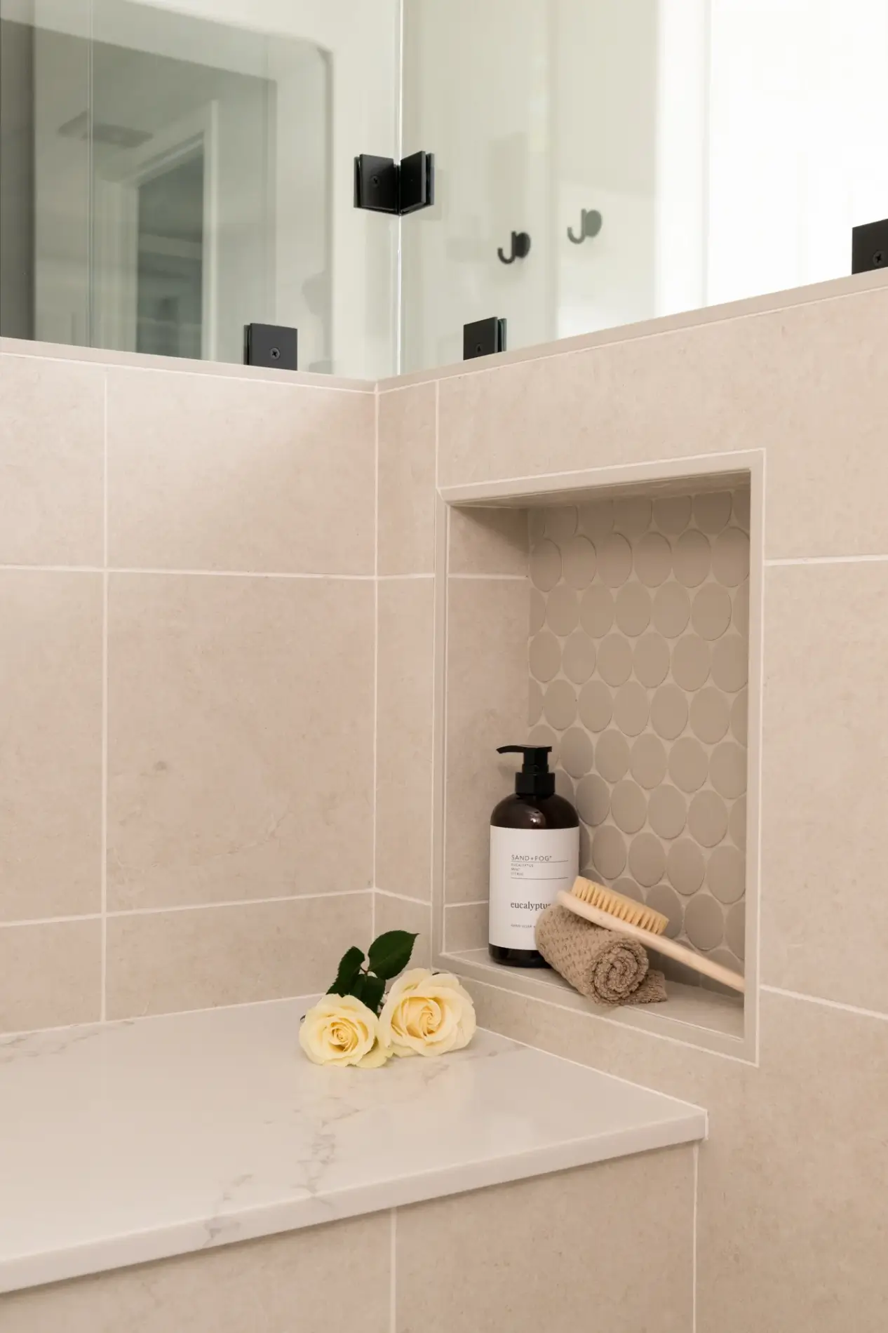 shower-includes-a-shampoo-niche-and-bench-seat