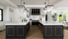 two-peninsulas-and-an-island-were-reimagined-into-2-large-islands-1-includes-seating-for-8-the-other-includes-a-sink-paneled-dishwasher-and-additional-storage