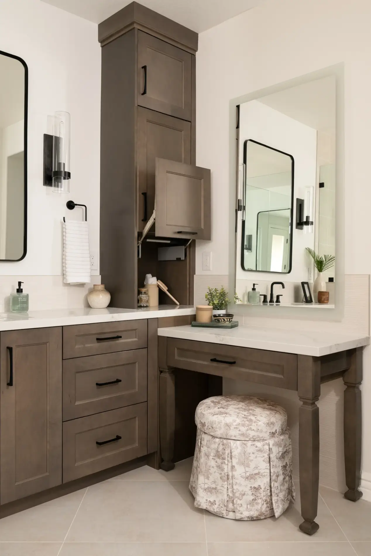 Her-vanity-includes-a-dedicated-make-up-station-with-pop-out-storage-cabinet-to-conceal-beauty-supplies