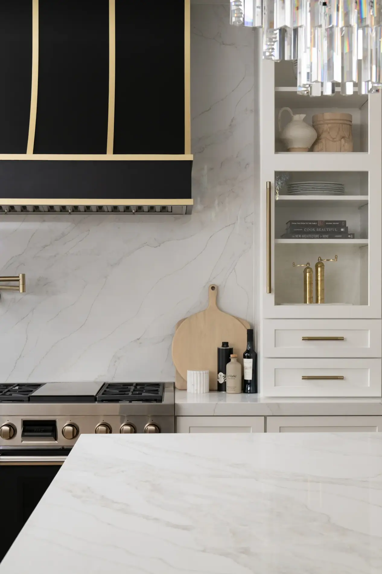 both-kitchens-have-polished-quartz-countertops-in-Sterling-Light-and-porcelain-tile-backsplash-in-Polished-Luna-finish