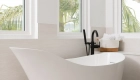 Fleurco-Molto-Freestanding-white-tub-with-floor-mount-tub-filler-in-matte-black