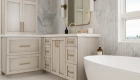 Omega-cabinets-in-Pure-White-finish-with-Brushed-Sephia-glaze-and-honey-bronze-pulls