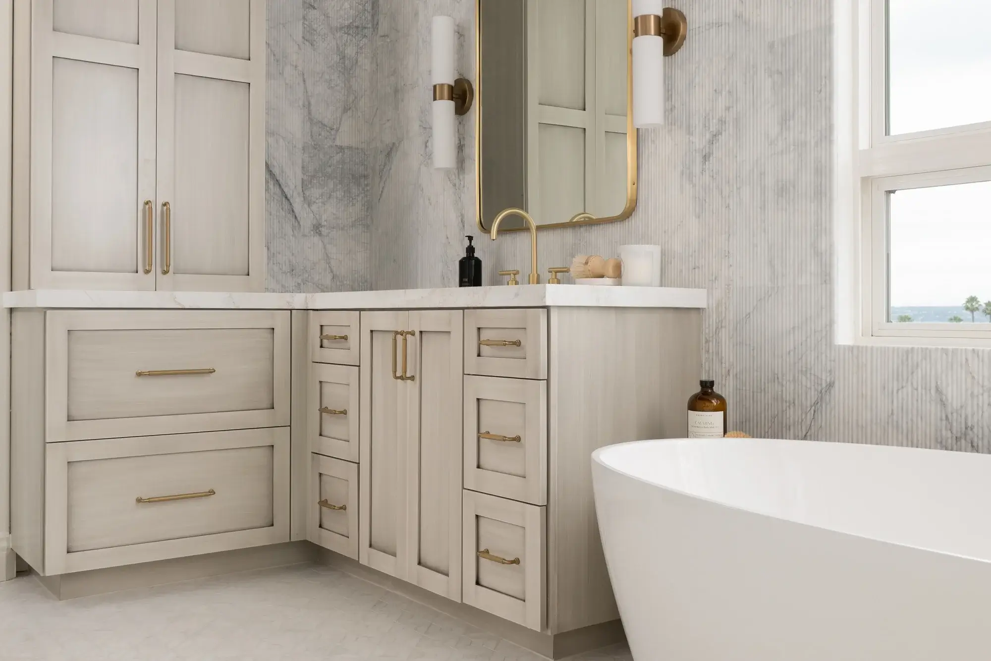 Omega-cabinets-in-Pure-White-finish-with-Brushed-Sephia-glaze-and-honey-bronze-pulls